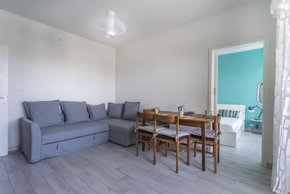 Apartment, 1 Bedroom | Living area | Flat-screen TV