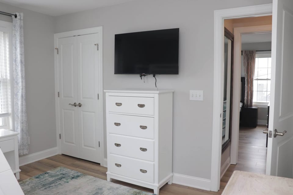 Bedroom Two storage and Smart TV