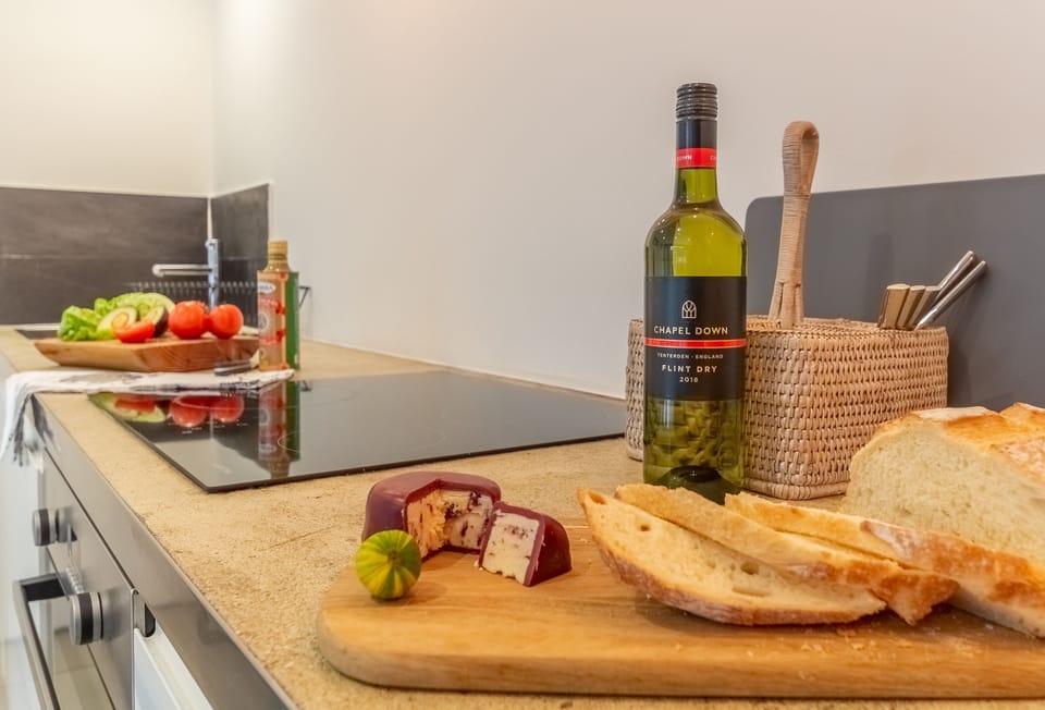 Ground floor: Fully-equipped kitchen with electric oven and induction hob