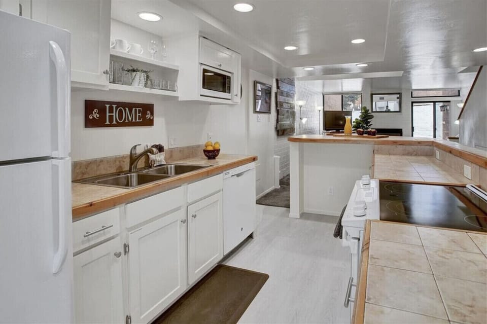 Kitchen and open dining and living area.  So no one misses a thing!