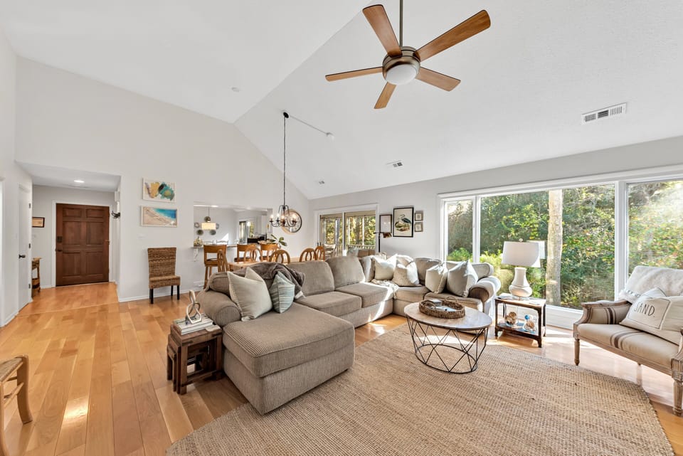 Enter this great open floor plan home.  Full ceiling to floor windows let all the beauty of Seabrook Island into your home