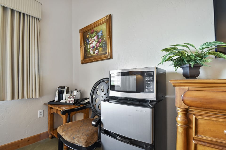 Guest bedroom's mini refrigerator and microwave