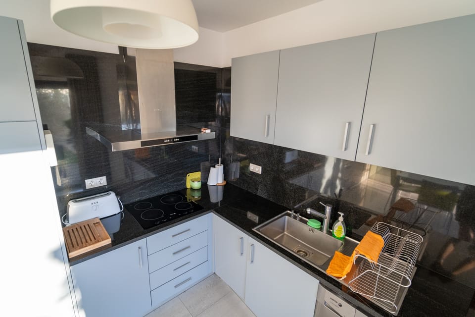 Kitchen with all modern appliances, including a dishwasher