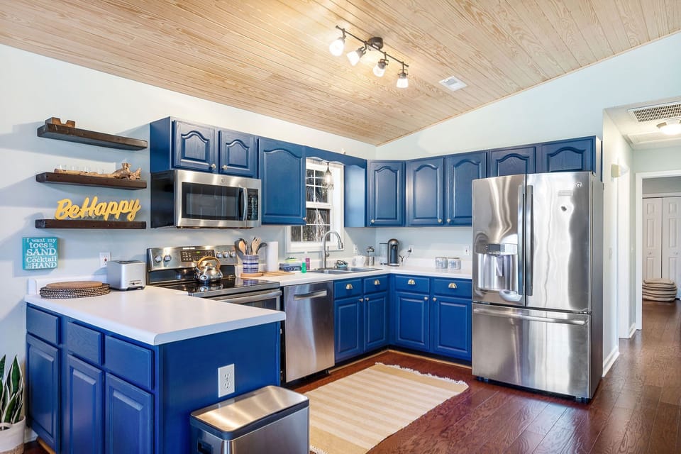 Cook up a feast in this large, modern kitchen! Featuring sleek stainless steel appliances and all the tools you need for effortless vacation dining.