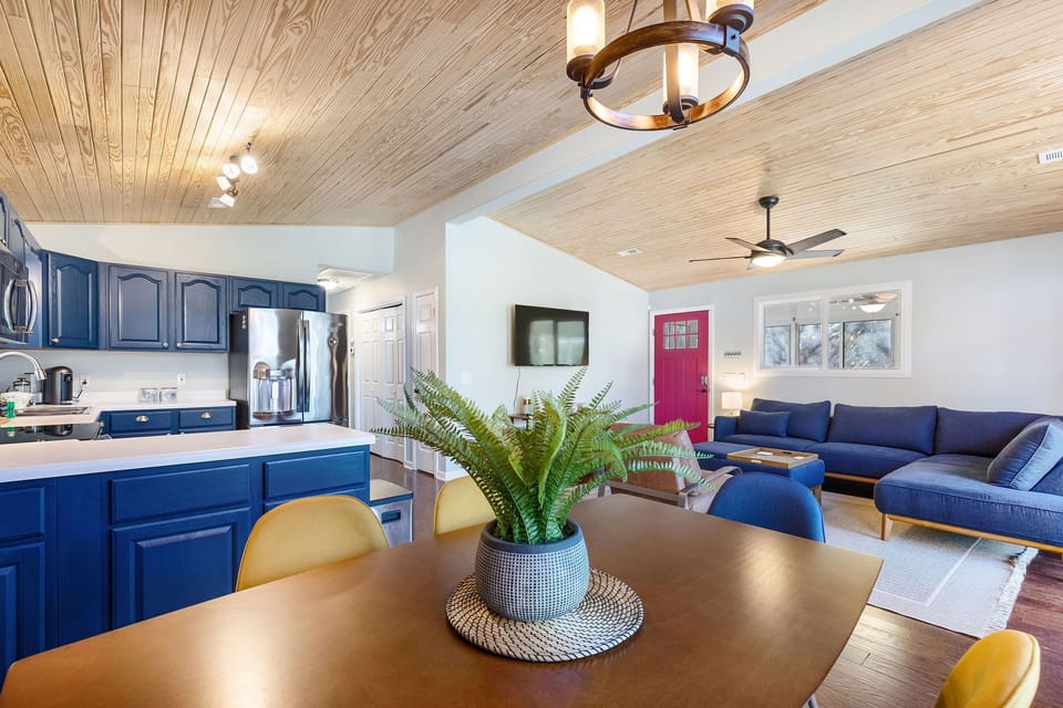 Gather 'round! Enjoy meals together at the dedicated dining area, perfect for family dinners or a fun game night.