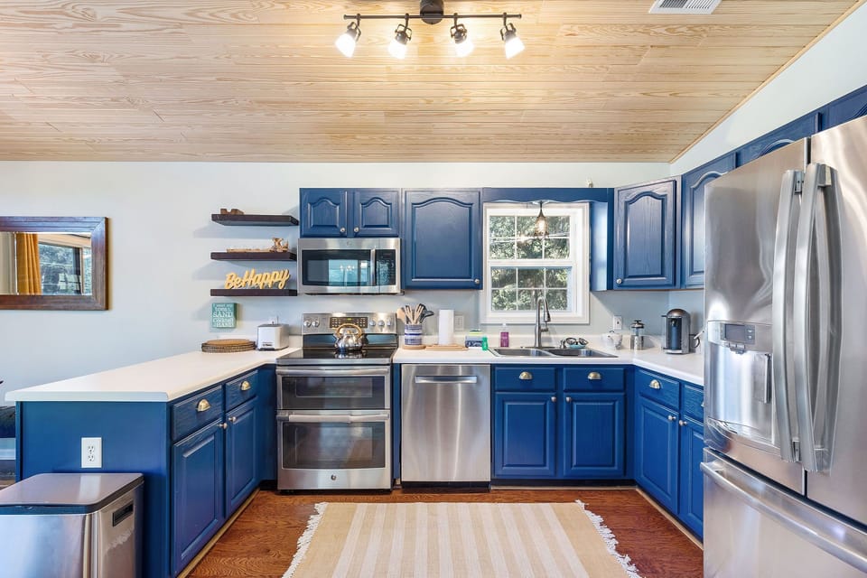 Cook up a feast in this large, modern kitchen! Featuring sleek stainless steel appliances and all the tools you need for effortless vacation dining.