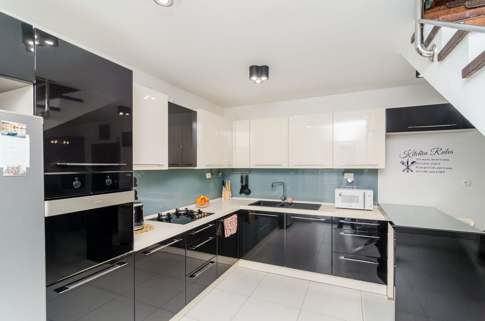 Apartment (Four Bedroom Duplex Apartment) | Private kitchen | Fridge