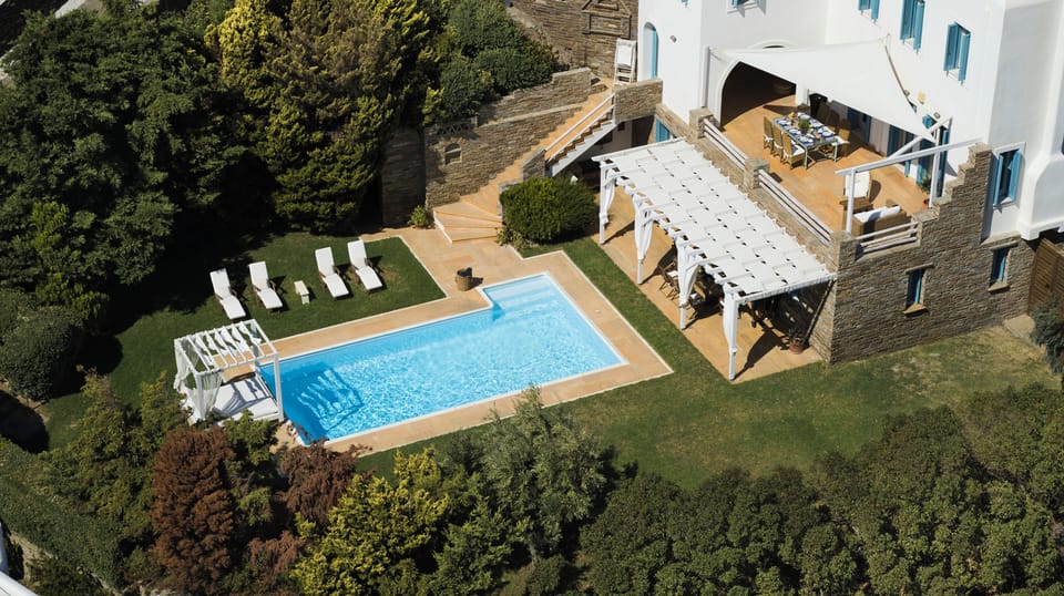 Aerial view of the lush garden and private pool at Villa Etheria.