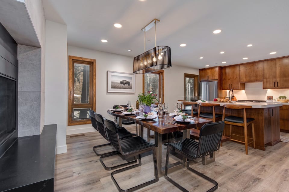 Fully equipped kitchen with new appliances, Log dining table with seating for eight, access to patio