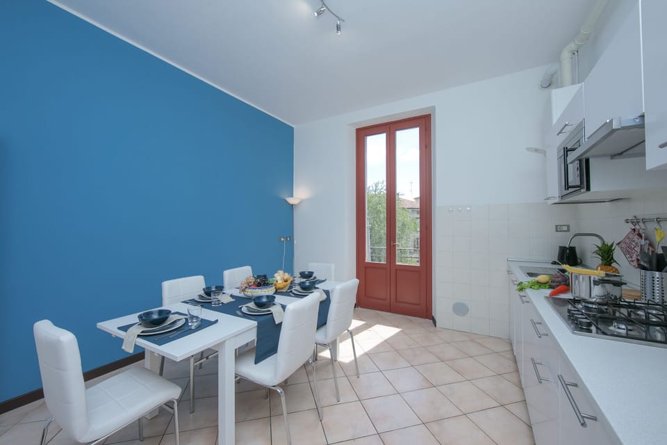 Kitchen with entrance to small balcony