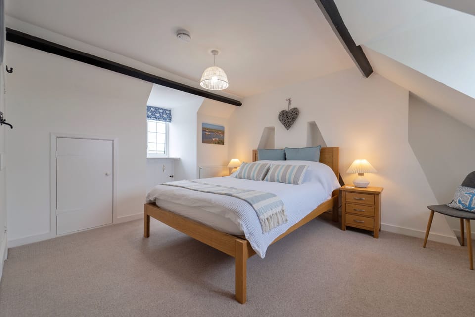 Second floor: Master bedroom with king-size bed