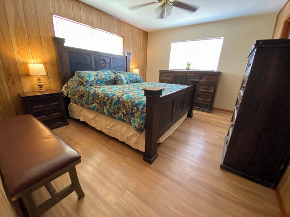 NORTH STAR - THE MASTER BEDROOM HAS WOOD FLOORS, HANDSOME FURNITURE, SPACIOUS AND ENSUITE BATHROOM.