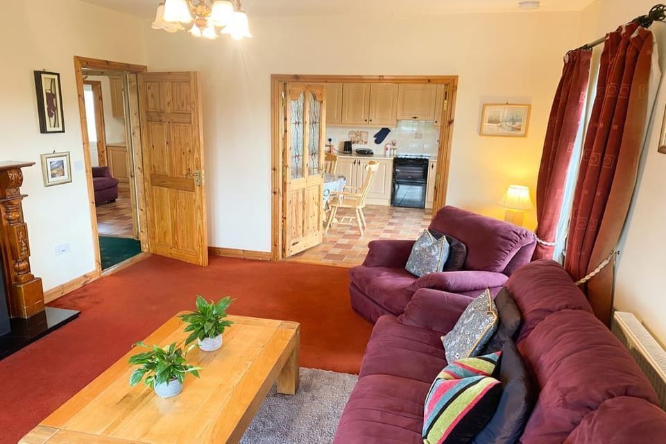 Cosy sitting room with open fire.