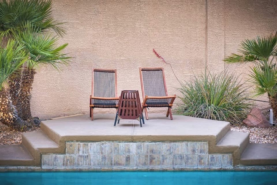 A small fire pit by the pool creates a fantastic experience at night. 