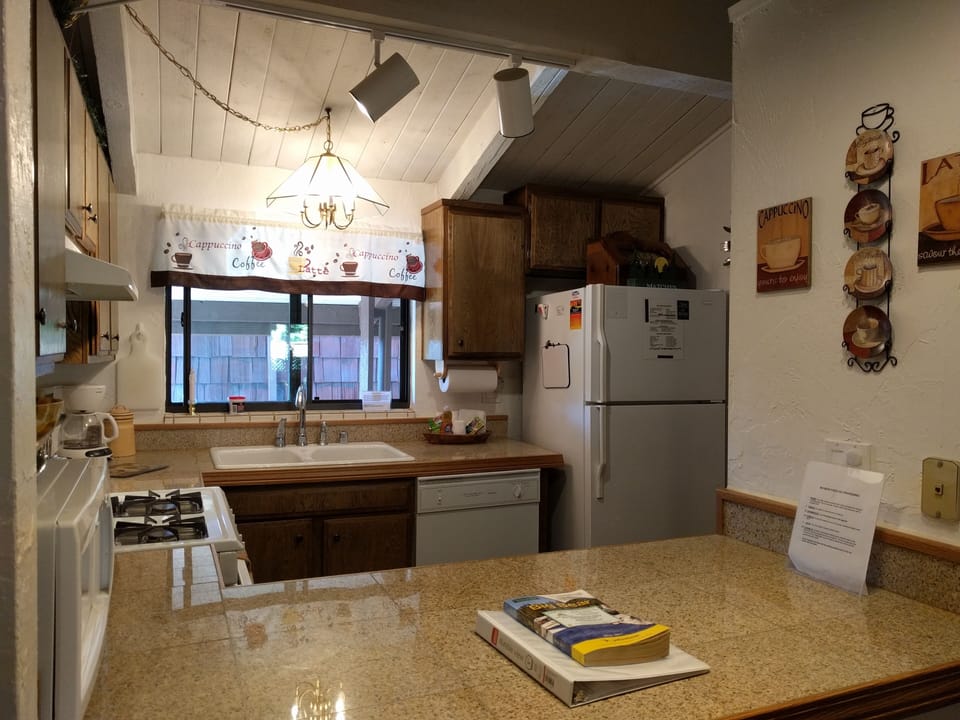 Kitchen has full sized appliances