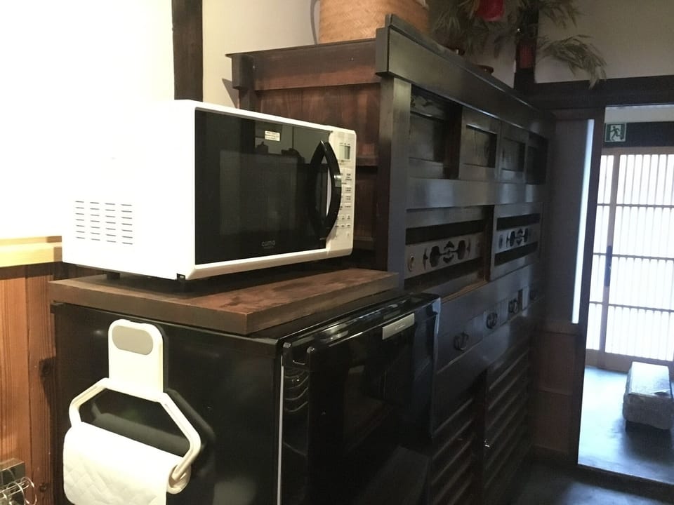 Old Mizuyaki (cupboard) and refrigerator and microwave