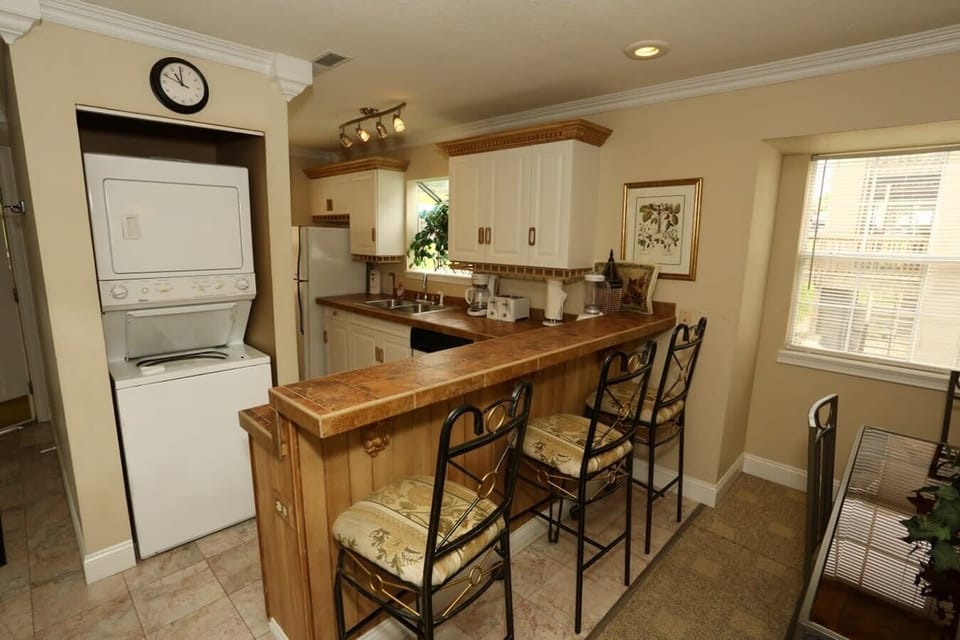 Laundry room in condo with Washer and Dryer.