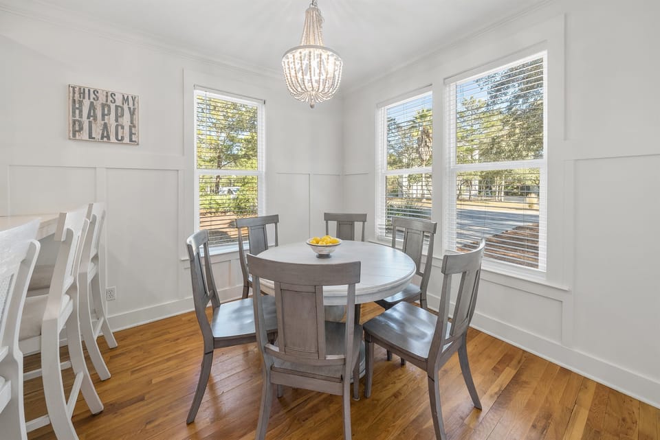 Gather around your bright dining nook where natural light streams through large windows, creating the perfect spot for memorable meals together.