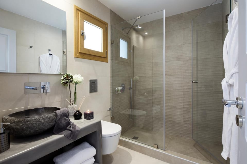Shower, free toiletries, hair dryer, bathrobes