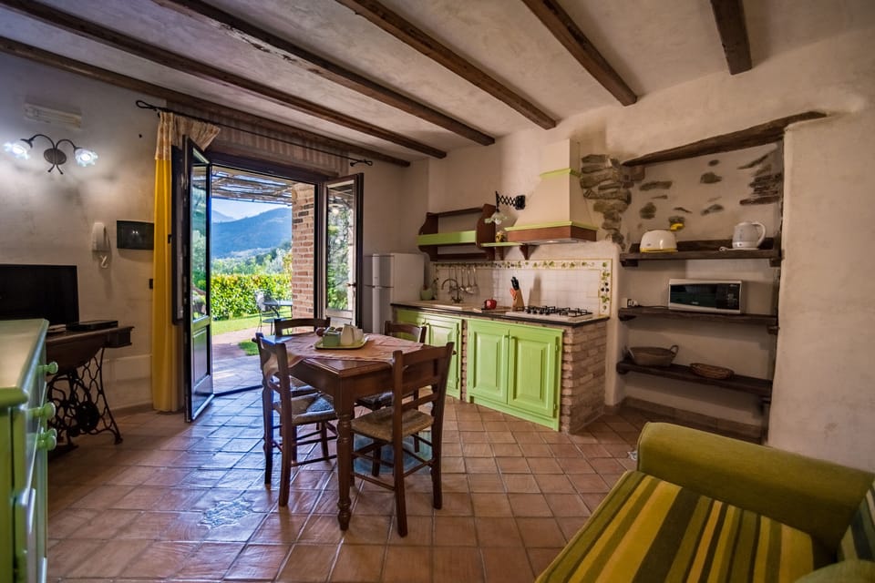 Apartment, 1 Bedroom | Living area | 28-inch flat-screen TV with satellite channels, TV