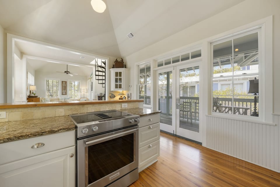 KITCHEN/DINING WITH BALCONY ACCESS