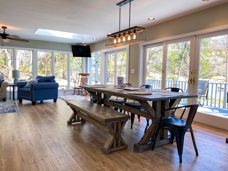 Dining, Kitchen, Sunroom Living Area overlooking the golf course and pond.