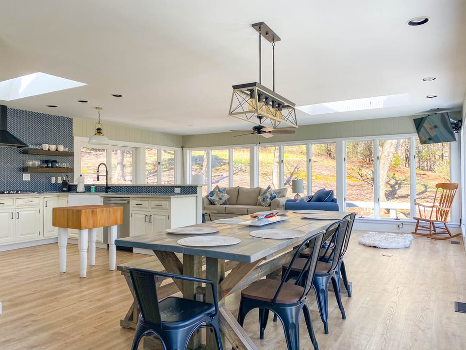 Dining, Kitchen, Sunroom Living Area overlooking the golf course and pond.