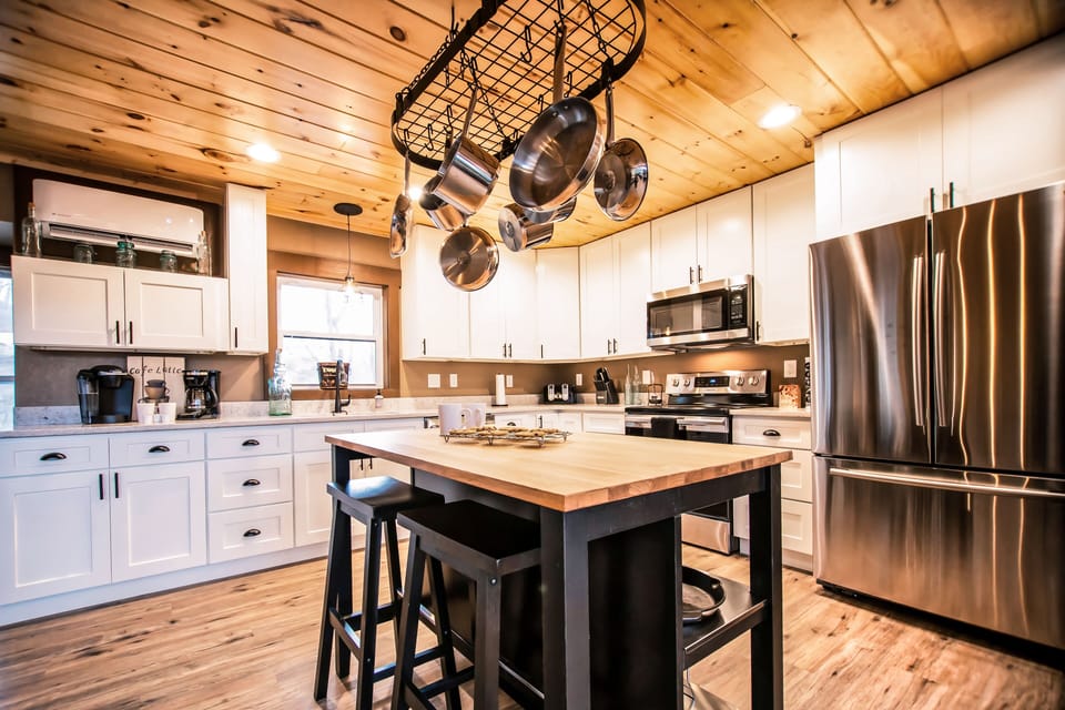 A suite of stainless steel appliances and extra amenities!