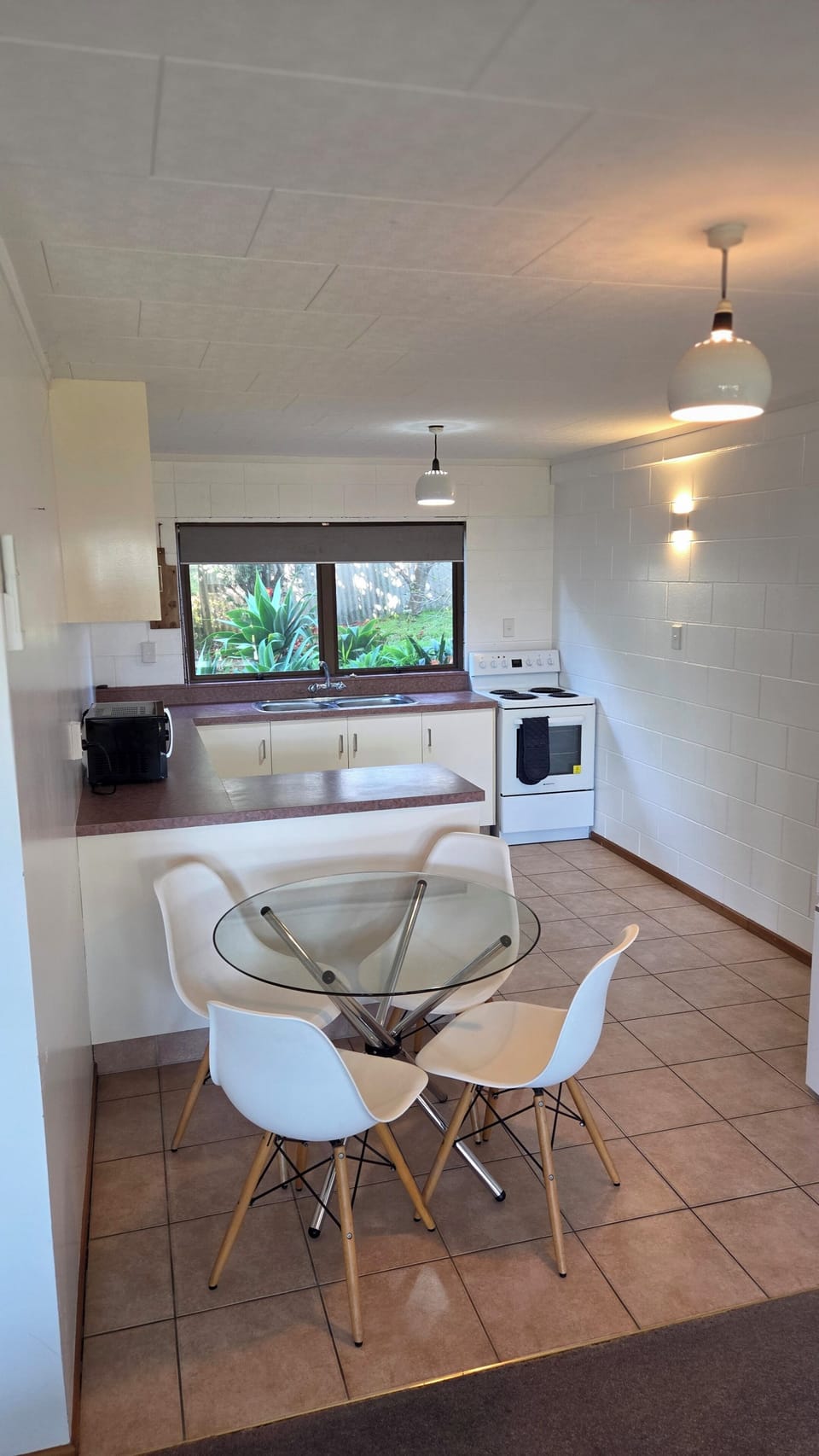 Full kitchen and open plan dining