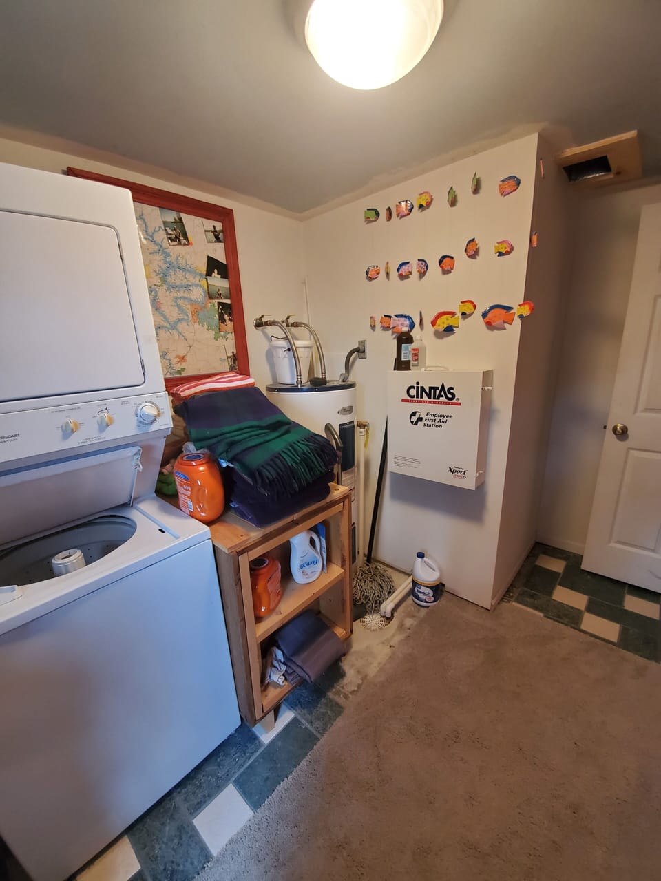 Utility Room with First Aid Washer and Dryer