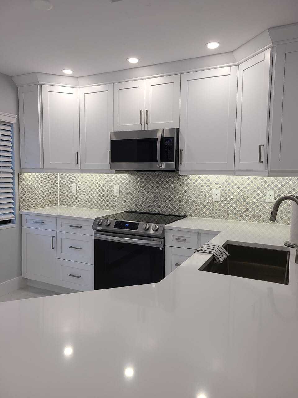 granite counters, all new appliances and cabinets, beautiful new floors