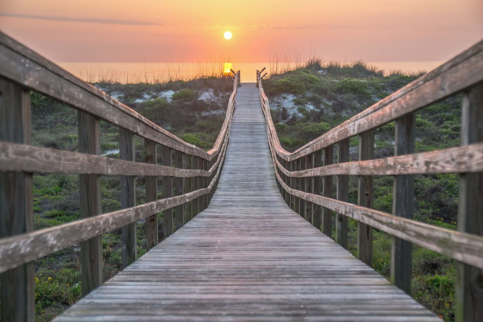 Golden-hour boardwalk walk to Butler beach by Crescent Beach 
