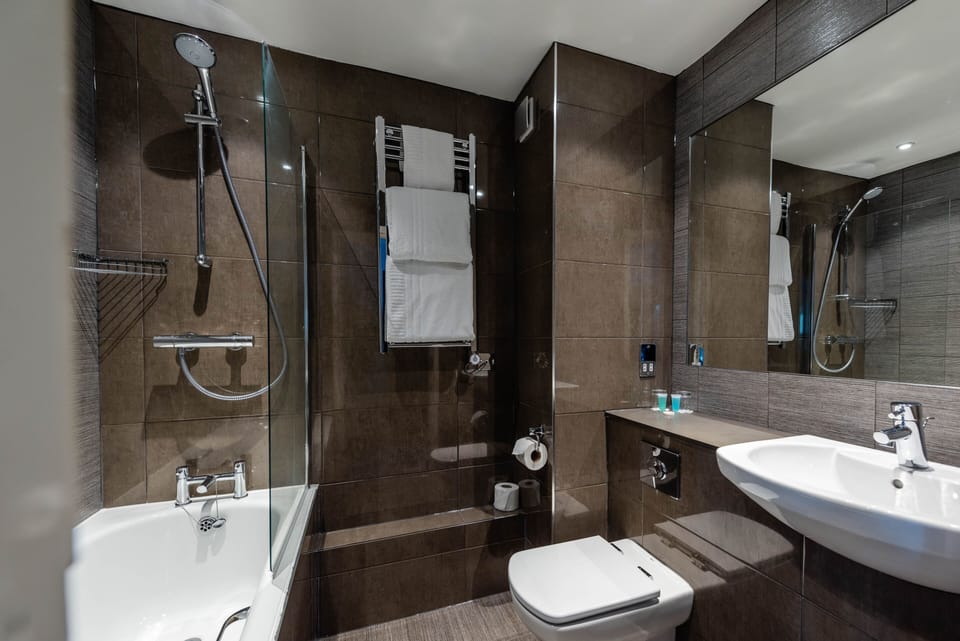Superior Room, Multiple Beds, Non Smoking (Converts to 2 Twin Beds) | Bathroom | Combined shower/tub, hair dryer, towels