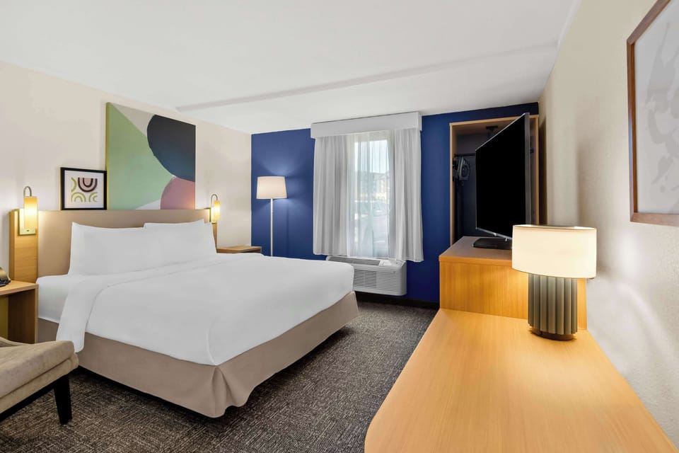 Room, 1 King Bed, Accessible (Roll-In Shower) | Desk, laptop workspace, iron/ironing board, cribs (free)