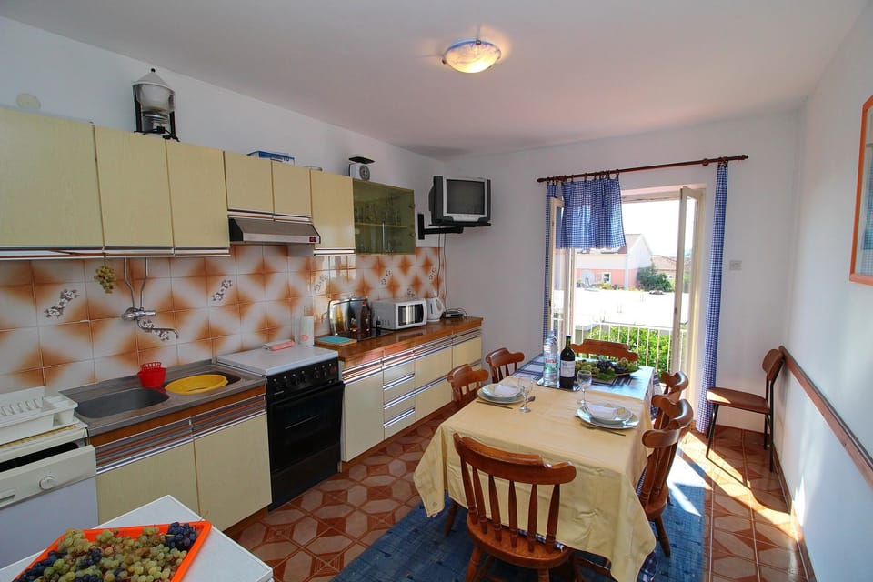 Apartment (Three Bedroom Apartment with Terrace) | Private kitchen | Fridge