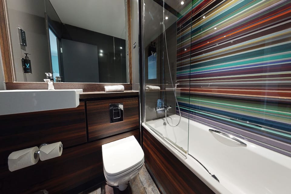 Eco-friendly toiletries, hair dryer, towels