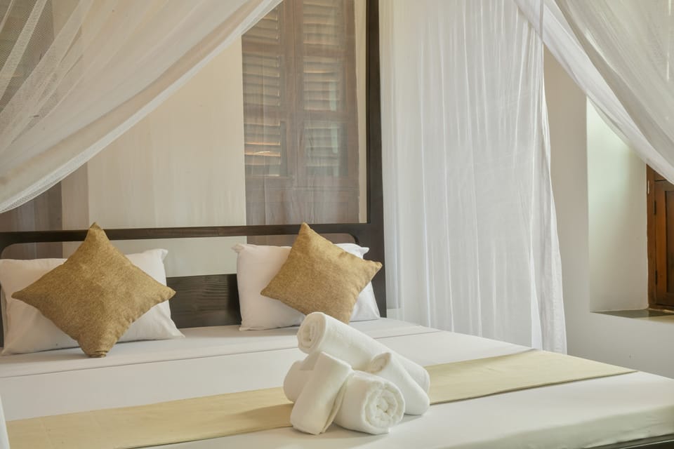 Deluxe Room, Ocean View | In-room safe, free WiFi, bed sheets