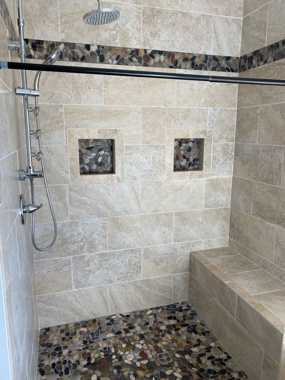 Main floor primary ensuite spa shower