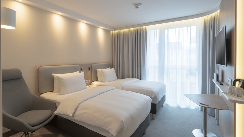 Standard Room, 2 Twin Beds | In-room safe, laptop workspace, blackout drapes, soundproofing