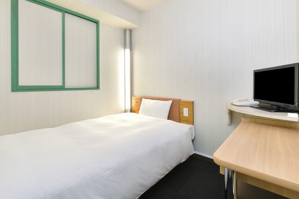 Enjoy a comfortable sleep in our functional rooms.