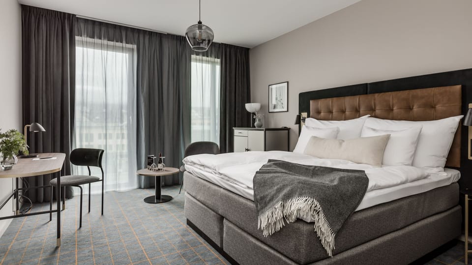 Down comforters, minibar, in-room safe, blackout drapes