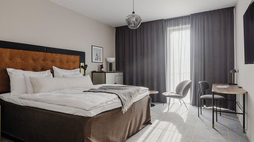 Superior Double Room, Non Smoking | Down comforters, minibar, in-room safe, blackout drapes