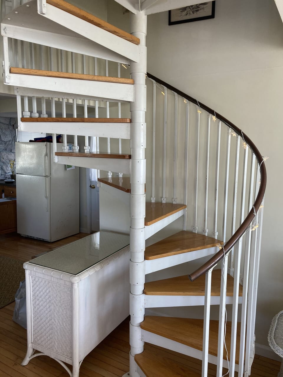 spiral stairs to second floor where you will find 2 more bedrooms and a 1/2 bath