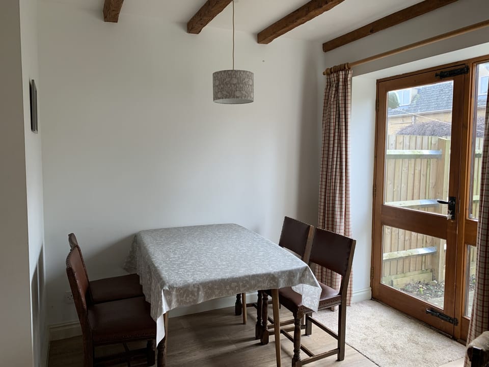 Dining area. There are further chairs in the bedrooms.