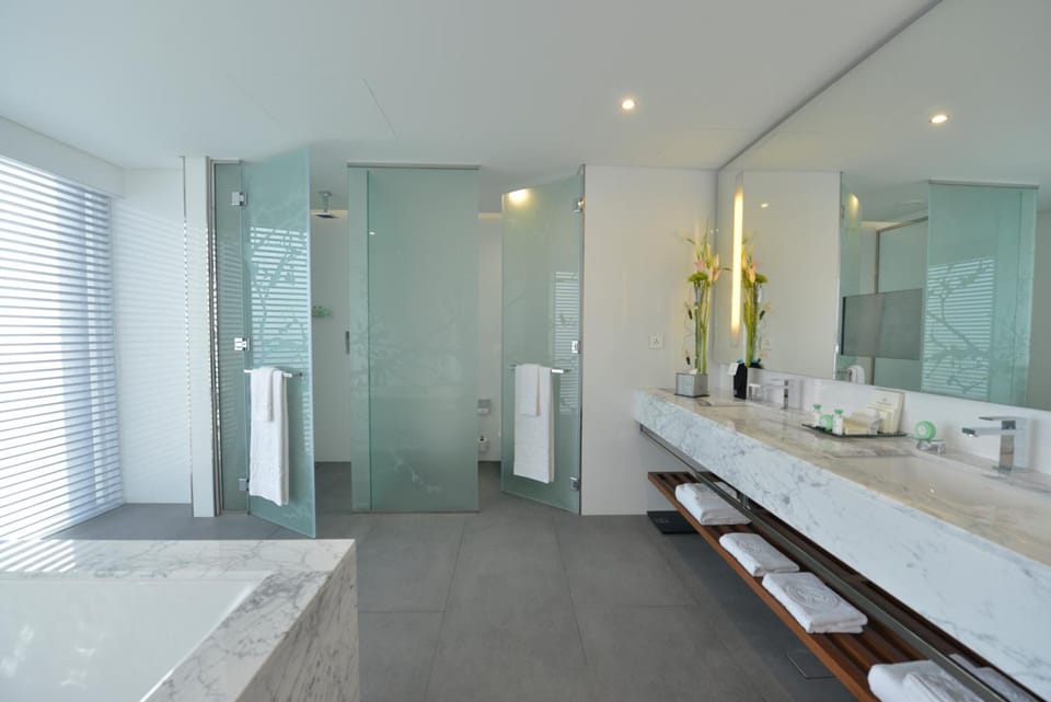 Separate tub and shower, free toiletries, bathrobes, slippers
