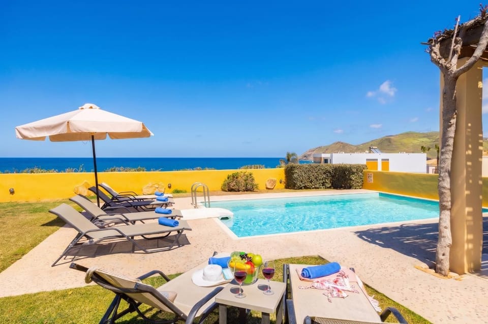 Private pool and terrace with panoramic sea views