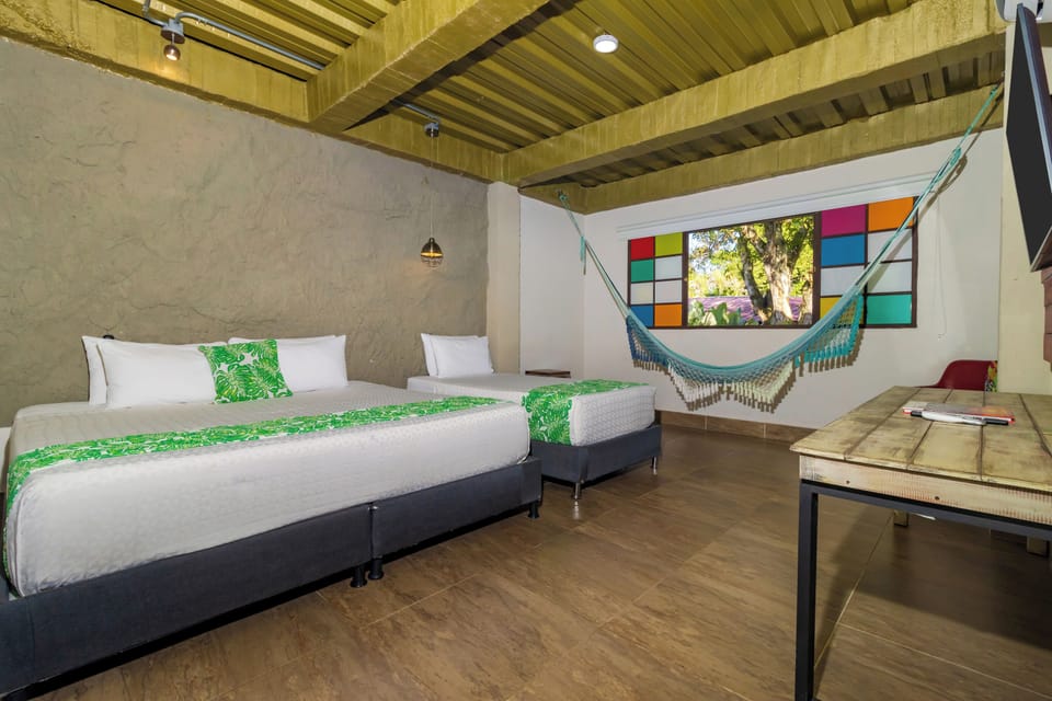 Executive Room, Multiple Beds | Premium bedding, individually decorated, rollaway beds, free WiFi