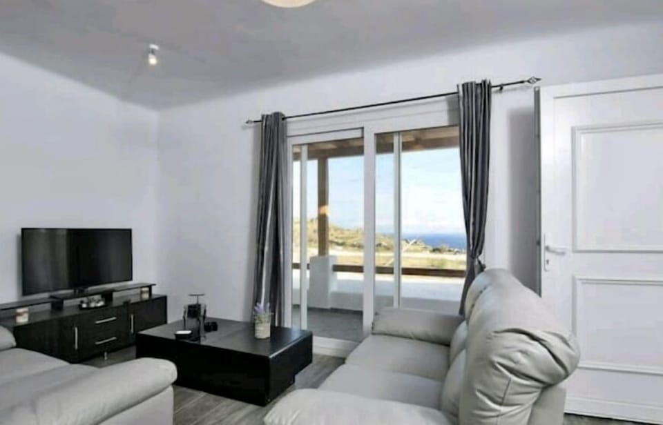 Apartment, 2 Bedrooms | Living room | LCD TV