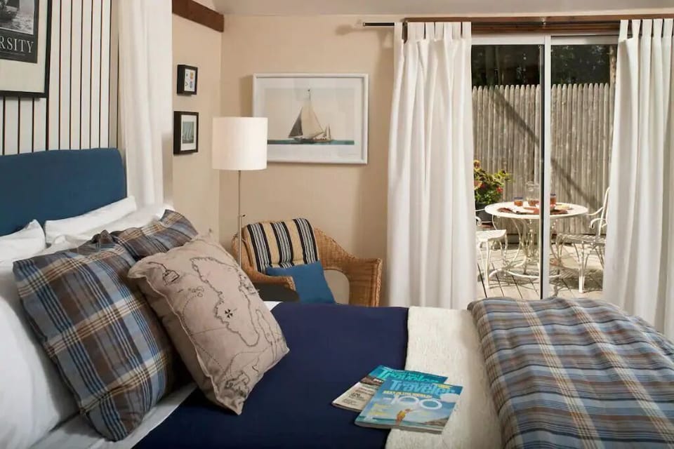 The Cottage features deluxe bedding with built in storage drawers for extended stays.