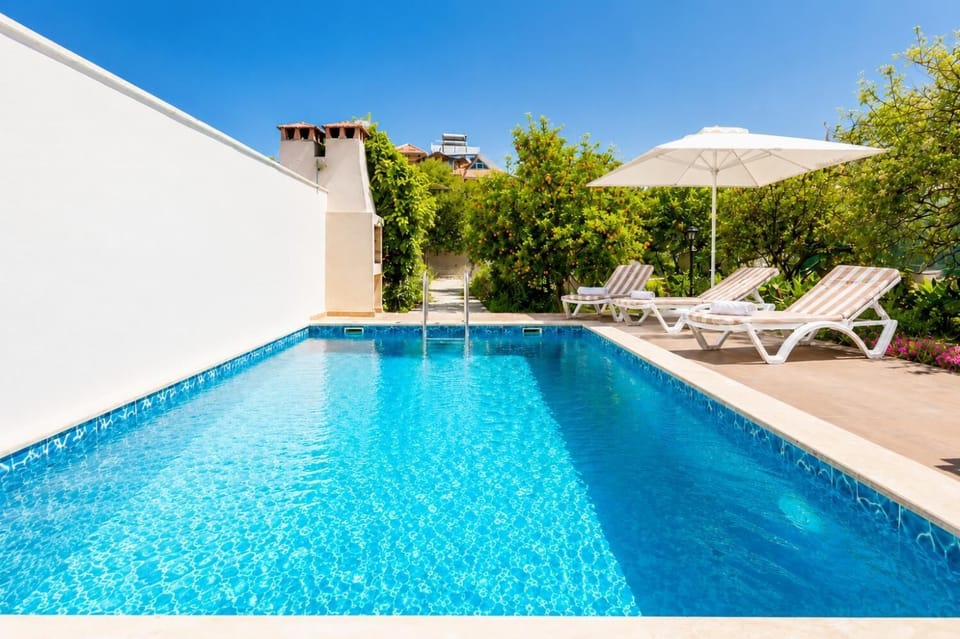 Private pool, terrace, and garden